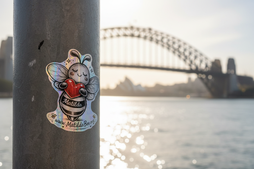 Sticker on post with Sydney Harbour background improved